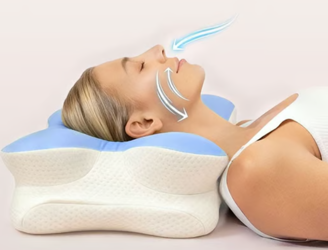 Woman resting on a contoured Melara Max Pillow