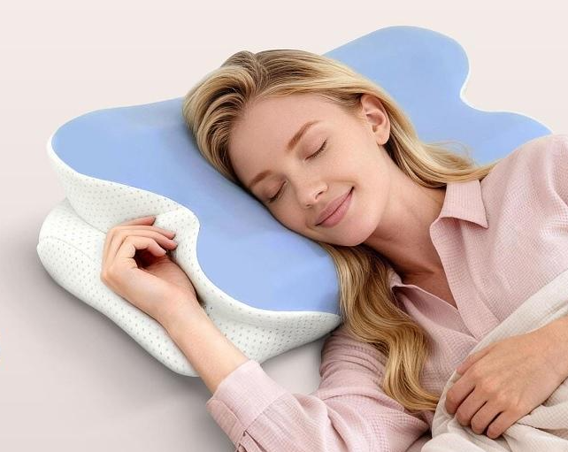 Woman resting on a blue Melara Max Pillow